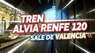 Valencia reflejada: Una perspectiva única del tren Alvia 120 🛤️
