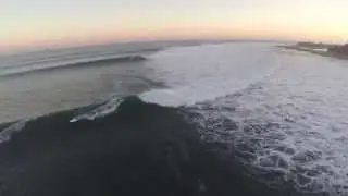 Laird Hamilton SUP surfing epic waves in Malibu!! Shoots the pier twice!!