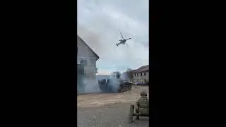 AH-64 Apache firing at Russian tank with M230 chain gun