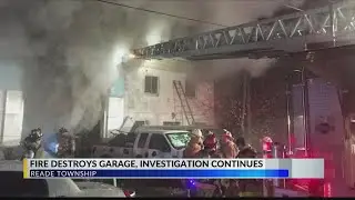 Police investigate Reade Township garage fire