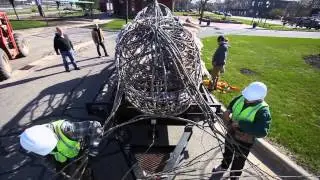 Watch 26-foot Great Horned Owl sculpture's arrival to downtown Muskegon's Visitors Bureau