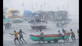 Cyclone batters India as country fights deadly COVID spike