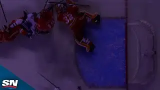 Flames' Dustin Wolf Makes A Great Save While In The Dark