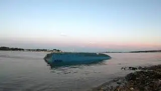 Baiter Park in Poole - Boat gently rocks on a summers evening- 4K footage