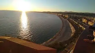 Panoramic view of sunset over the Mediterranean Sea at Promenade de Anglais, Nice, France 