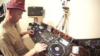 WHAT DOES A DJ HEAR WHILE THEY USE THEIR HEAD PHONES?