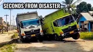 Two Heavy Trucks Tilted Sideways &mdash; Seconds from a Deadly Accident