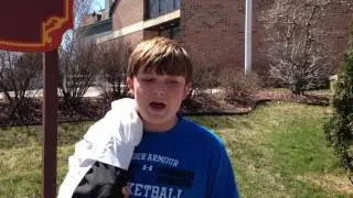 Chris Sweeney, 13, asked Cardinal Timothy Dolan to keep Pastor Austin Titus at Holy Family R.C. Chur