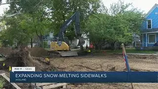 Expanding snow-melting sidewalks