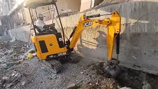 JCB18Z Mini Excavator - Trenching along a building wall @ Pune