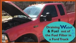 Грузовик Ford объемом 7,3 литра: слив лишней воды из топливного фильтра грузовика Ford