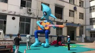 Inflatable Mascot with guitar for Visual Feast Stage Decoration