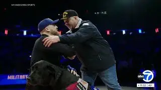 Paws of War: Veteran recognized and presented with Service Dog at Knicks game on Veteran's Day