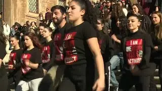 Women's rights group stages flash mob in Rome to protest gender violence
