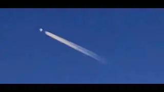 Saturday evening, 5/3/25, spinning horseshoe orb with a trail high above in the west. Slowed, edited