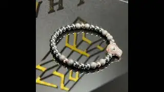 V&ograve;ng Tay Phong Thuỷ Đầu B&aacute;o Leopard Mắt xanh Emerald mix đ&aacute; Hematite By Rajah Jewels
