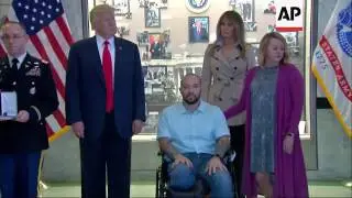 Trump awards Purple Heart at military hospital
