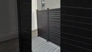 Composite deck glass railings and Hideaway privacy screen installed #compositedecking #construction