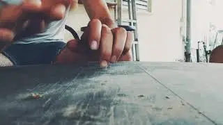 freestyle fingers drumming on a garden table by Talarel