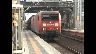 Heavy freight train with 145 042 8 of DB Railion passes the station  #145 #cargo #trainspotting
