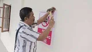 Displaying posters on NO SMOKING ZONE at our School campus