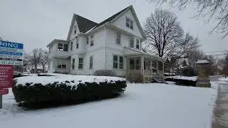 Walk through snow in Naperville, Illinois Historic District