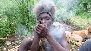 BUSHLIFE SURVIVAL BY HADZABE TRIBE HUNTERS IN THE JUNGLE OF AFRICA TANZANIA