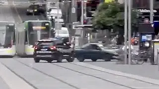 Two on the run after terrifying Bourke Street incident