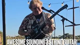 Playing Some Old Styled Blues On This Great 3 String Guitar Build A Tribute To George Straight