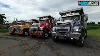 Four Mack Granite Dump Trucks on the job