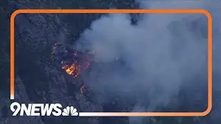 Small fire burning west of Boulder