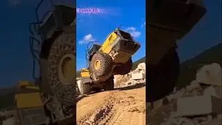 Watch as a wheel loader rolls out of a marble quarry on two wheels #shorts #caterpillarwheelloader