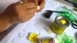 Como hacer flores con   botellas de  plastico