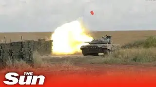 Pro-Russian forces carry out explosive tank drills in Donetsk