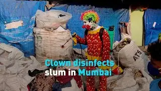 Clown disinfects Mumbai slum, informs residents on COVID-19