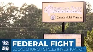 Raided local church accused of stalling federal investigation
