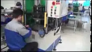 Intermediary coil forming machine for motor stator coils
