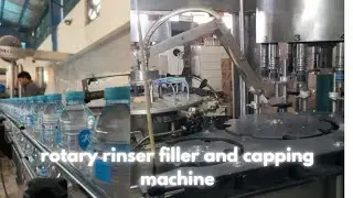 Rotary rinser filler and capping machine