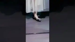 Black ballet flats with silver ribbon