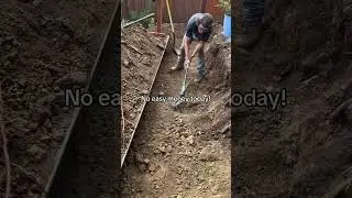 Didn&rsquo;t realize we were digging into a mountain lol #contractor #fyp #concrete #landscape