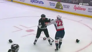 Joel Edmundson and Brandon Duhaime exchange pleasantries.