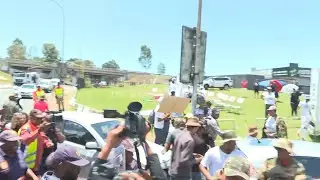 Police clash with protesters in Soweto, near G20 summit venue, arrest two