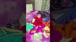 Paisa hi Paisa! 🤑 Cute baby playing with cash #trending #shortsfeed #trending