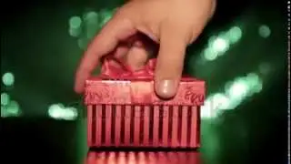 Footage male hand opening and presenting red gift box with lightning  on green spark background
