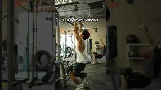 What &ldquo;pull from your elbows&rdquo; mean on a lat pulldown