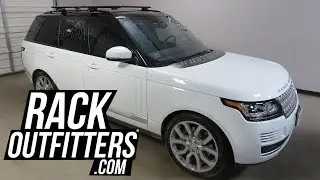 Land Rover Range Rover с поперечинами багажника на крышу Thule Rapid Crossroad AeroBlade