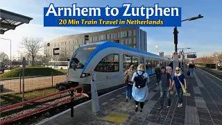 By train from Arnhem to Zutphen The Netherlands through a snowy landscape 