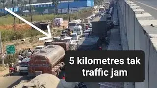 A huge track is going through a fallen tree on the road near Abdullapur 5 km long heavy traffic jam.
