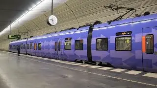 EMU Alstom Pågatågen X61 stops and departs from Triangeln station, Malmö, Sweden...