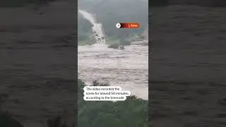 Texas floodwaters rise over causeway